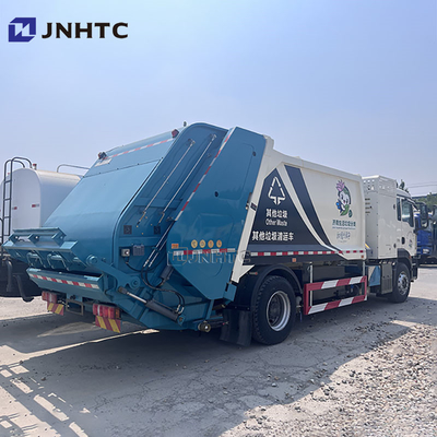 Howo SITRAK 4*2 Achterlader Compressed Garbage Trucks vuilniswagen