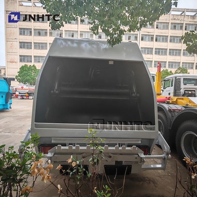HOWO vuilniswagen Compactor 4x2 Euro 2 Afvalverwijdering Vuilniswagen Achterlader Truck Groen Diesel Model Nieuw