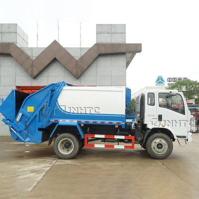 Vrachtwagen van de het Huisvuilpers van HOWO 4x2 de Kleine 5m3