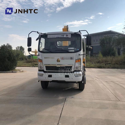 Vlakke plaatlading Vrachtwagen Opgezet Crane Sinotruk HOWO 4x4 Al Wielaandrijving